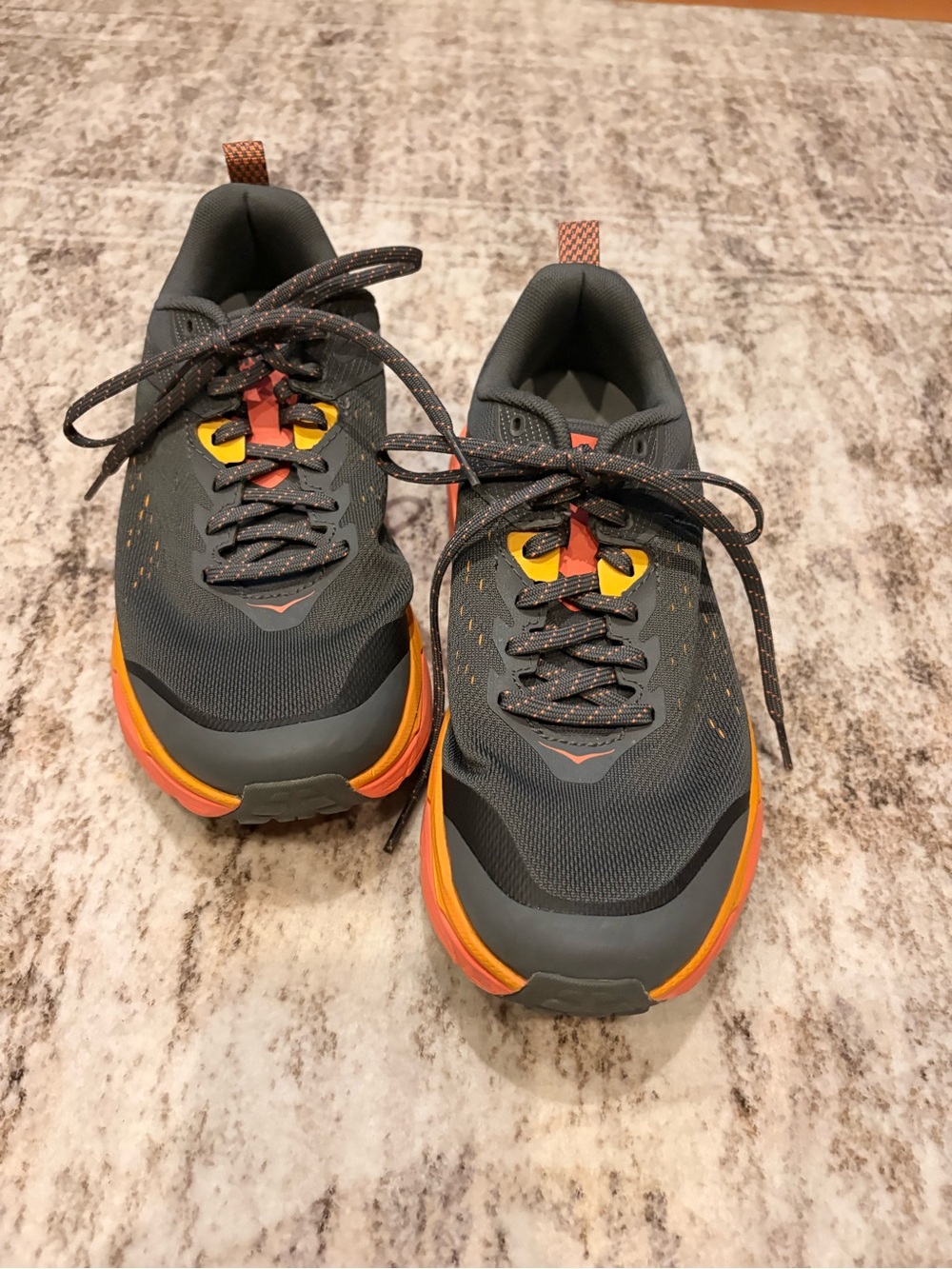 Hoka One One  Trail Runners in Gray with Orange and Yellow Accents